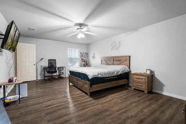 172 High School Dr, Lewisville, TX 75057 - bedroom featuring ceiling fan, baseboards, visible vents, and wood finished floors
