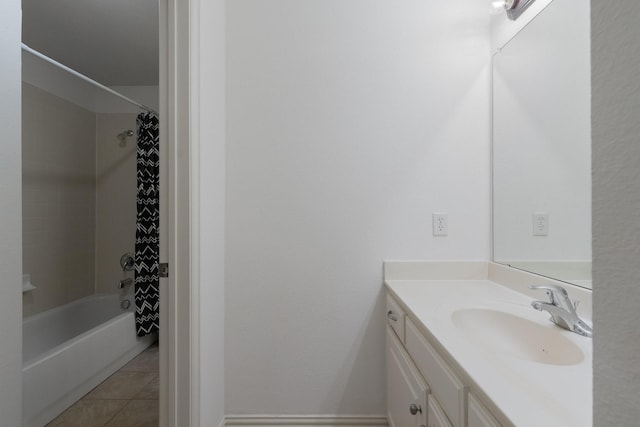 bathroom featuring vanity, tile patterned flooring, and shower / bath combo