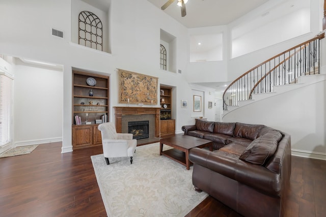 2131 Channel Islands Dr, Allen, TX 75013 - living room featuring dark wood-type flooring, stairs, and visible vents