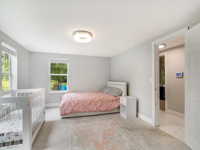 bedroom featuring baseboards