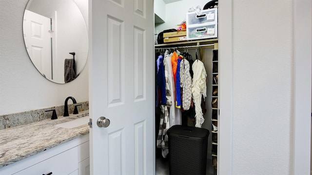 closet featuring a sink