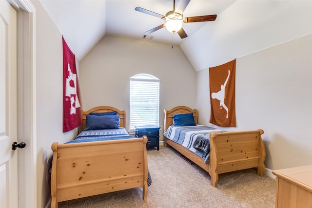 bedroom featuring carpet floors, a ceiling fan, and vaulted ceiling