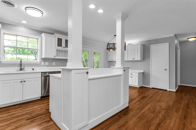 414 Jolee St, Richardson, TX 75080 - kitchen featuring crown molding, visible vents, stainless steel dishwasher, ornate columns, and a sink