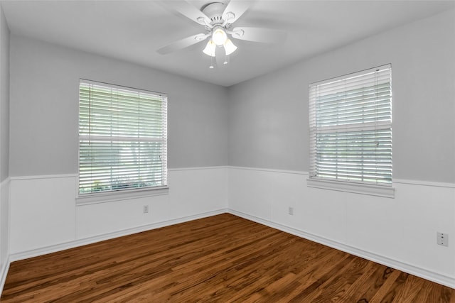 414 Jolee St, Richardson, TX 75080 - empty room with a ceiling fan, wood finished floors, and a wainscoted wall