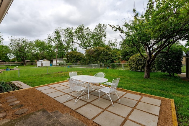 414 Jolee St, Richardson, TX 75080 - view of patio featuring a fenced backyard and outdoor dining area