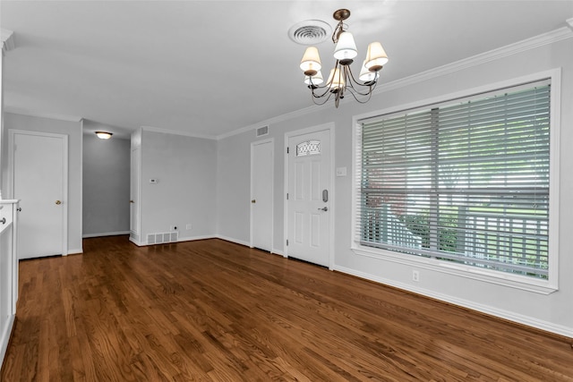 414 Jolee St, Richardson, TX 75080 - empty room with an inviting chandelier, baseboards, wood finished floors, and visible vents