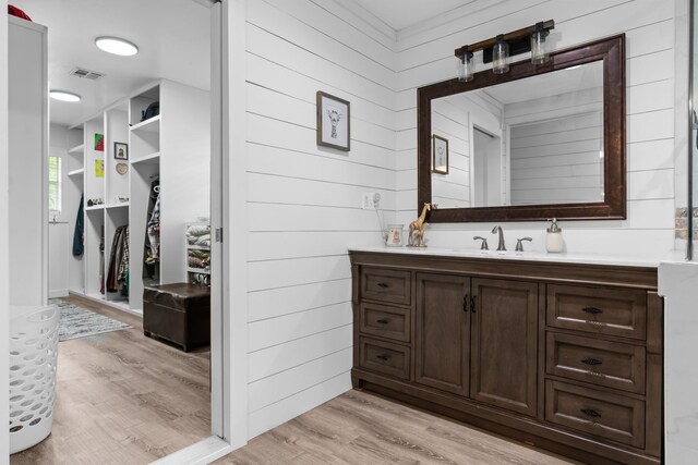 full bathroom featuring recessed lighting, a bath, and a stall shower
