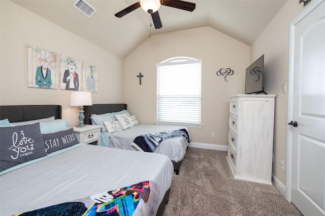 bedroom with ceiling fan, visible vents, vaulted ceiling, baseboards, and carpet