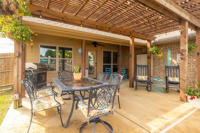 view of patio with ceiling fan, fence, grilling area, a pergola, and outdoor dining area