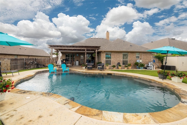 view of pool with a fenced in pool, a fenced backyard, and a patio area