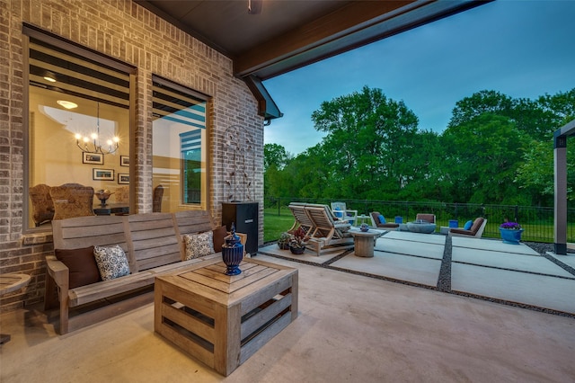 view of patio featuring fence and an outdoor living space