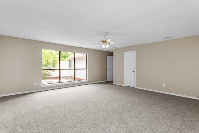 3813 Parkmont Dr, Plano, TX 75023 - spare room featuring carpet, visible vents, baseboards, and a ceiling fan