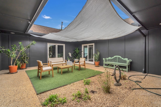 exterior space with an outdoor hangout area