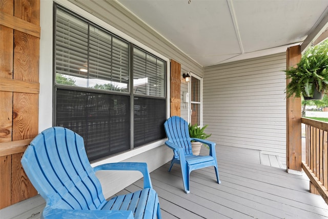 wooden terrace with a porch