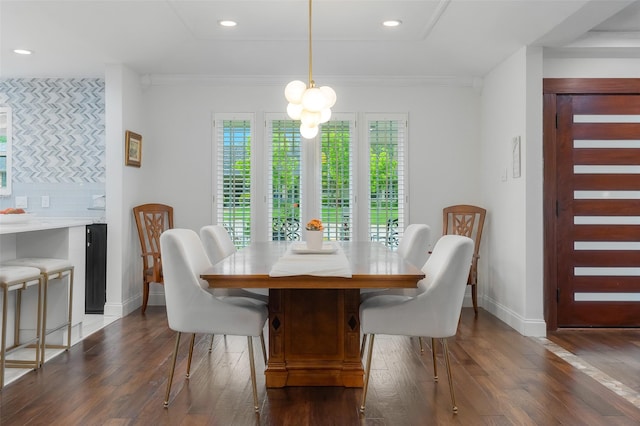 dining space featuring baseboards and dark wood-type flooring