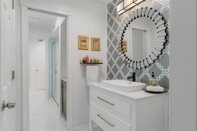 bathroom with vanity, marble finish floor, and visible vents