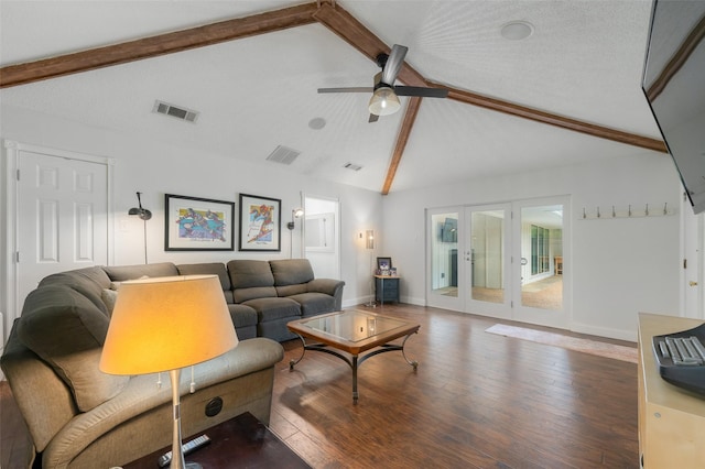 living room featuring visible vents, lofted ceiling with beams, baseboards, and a ceiling fan