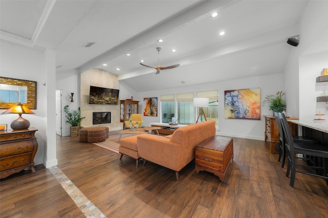 living area featuring a fireplace, ceiling fan, wood-type flooring, and recessed lighting