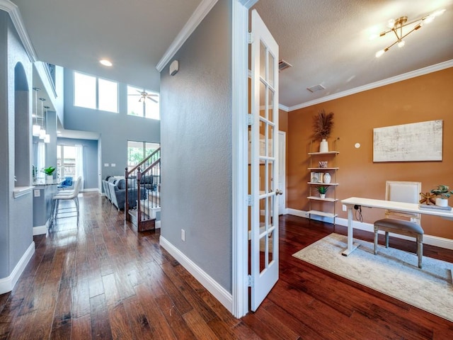 office space with ceiling fan, ornamental molding, french doors, and dark wood-type flooring