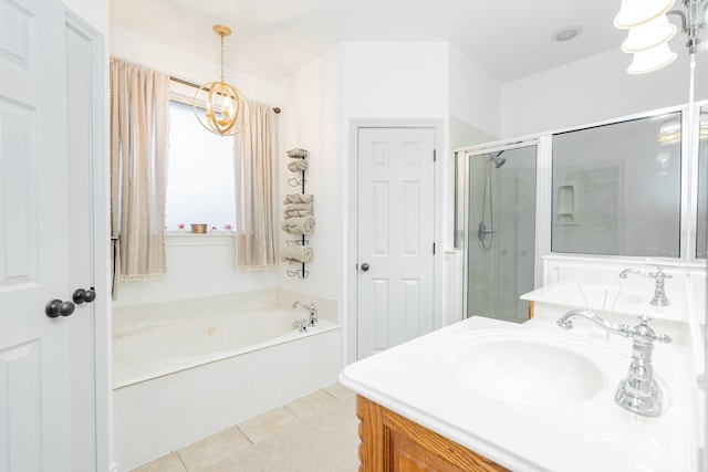 bathroom featuring vanity, tile patterned floors, a bath, and a shower stall