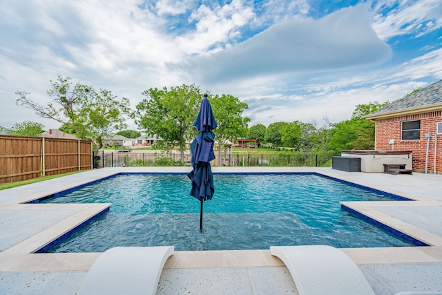 543 Islet Dr, Runaway Bay, TX 76426 - view of pool featuring a hot tub, a fenced backyard, and a patio area