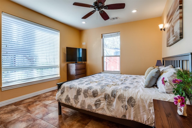 tiled bedroom with visible vents, recessed lighting, baseboards, and a ceiling fan