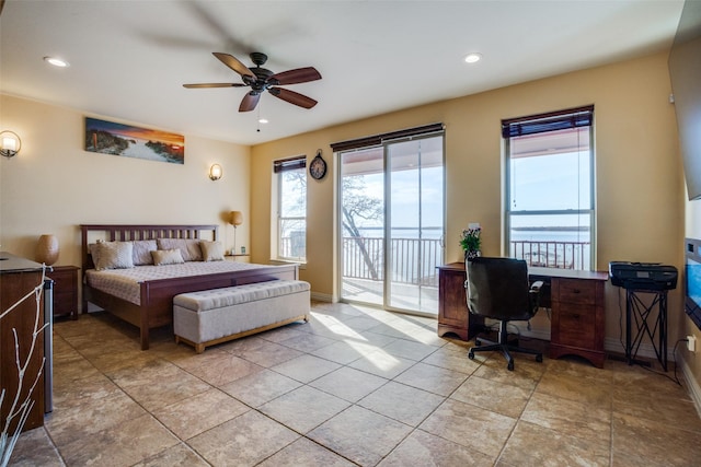 bedroom featuring access to outside, baseboards, and recessed lighting
