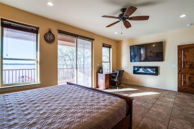 bedroom with baseboards, access to outside, tile patterned floors, and recessed lighting