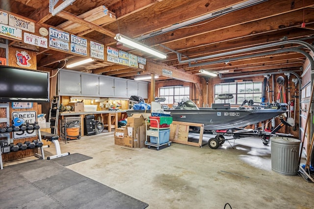 garage with a workshop area