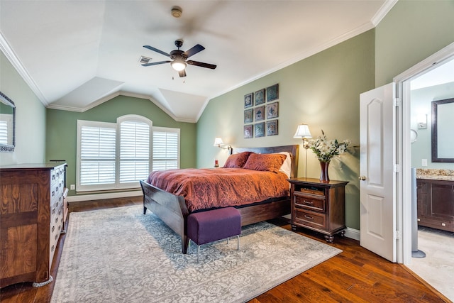 bedroom with visible vents, crown molding, baseboards, dark wood-style floors, and lofted ceiling