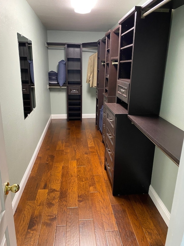 bathroom with a freestanding bath, a shower stall, vaulted ceiling, and vanity