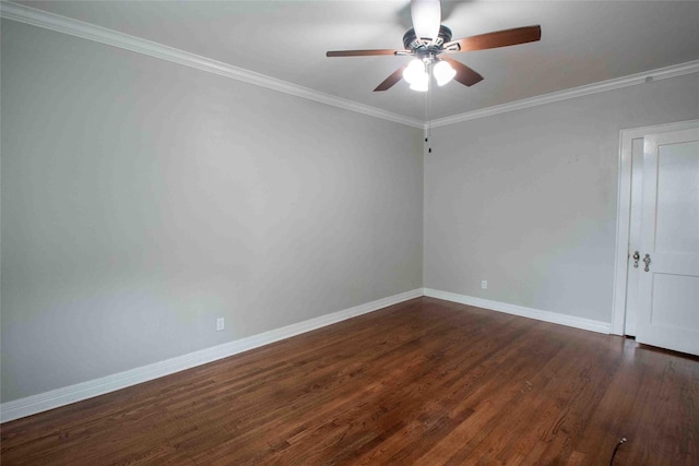 empty room with baseboards, ornamental molding, a ceiling fan, and dark wood-style floors