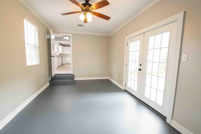 unfurnished room featuring crown molding, concrete flooring, french doors, baseboards, and visible vents