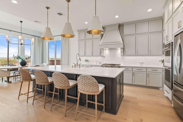 14336 Capridge Rd, Fort Worth, TX 76008 - kitchen with custom range hood, backsplash, a sink, light countertops, and a chandelier