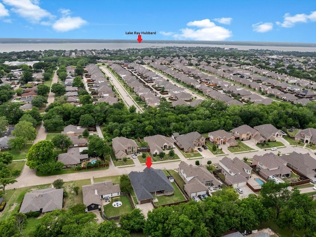 aerial view with a residential view and a water view