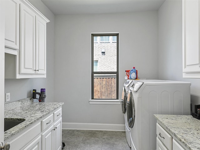12643 Canyon Oaks Dr, Frisco, TX 75033 - clothes washing area with cabinet space, independent washer and dryer, and baseboards