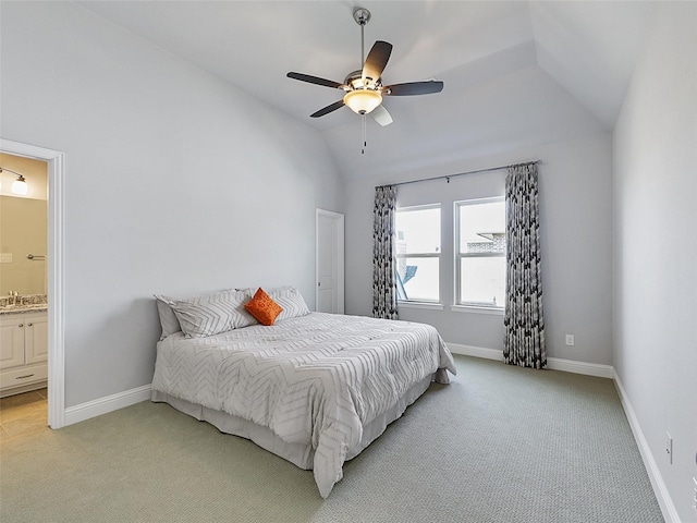 12643 Canyon Oaks Dr, Frisco, TX 75033 - bedroom featuring lofted ceiling, light carpet, ensuite bathroom, baseboards, and ceiling fan