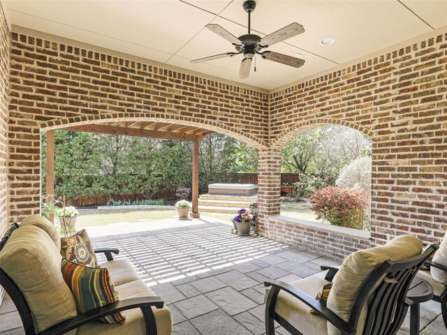 12643 Canyon Oaks Dr, Frisco, TX 75033 - view of patio / terrace featuring a ceiling fan, a fenced backyard, and a hot tub