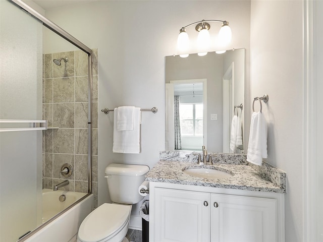 full bathroom with toilet, washtub / shower combination, and vanity
