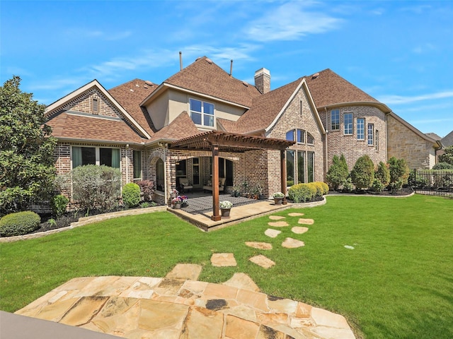 12643 Canyon Oaks Dr, Frisco, TX 75033 - back of house featuring a pergola, a patio area, a chimney, a shingled roof, and brick siding
