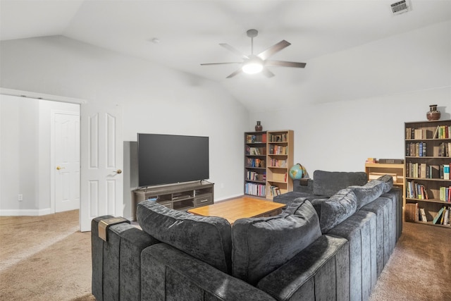 living area with carpet floors, visible vents, and lofted ceiling