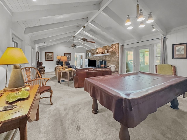recreation room featuring ceiling fan, light colored carpet, lofted ceiling with beams, and french doors