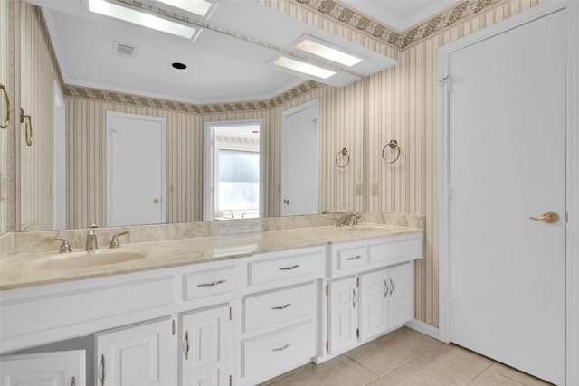 full bathroom with visible vents, a sink, tile patterned floors, and wallpapered walls