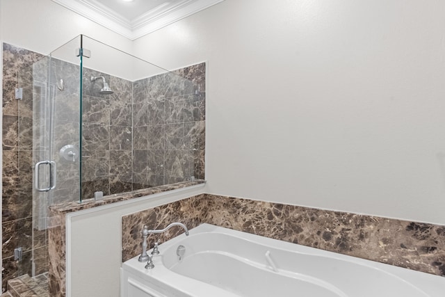 bathroom with crown molding, a bath, and a stall shower