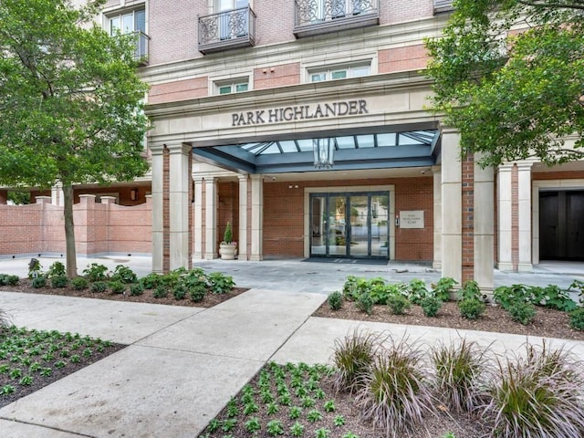 entrance to property with brick siding