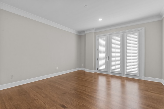 empty room with crown molding, baseboards, recessed lighting, and dark wood-style floors