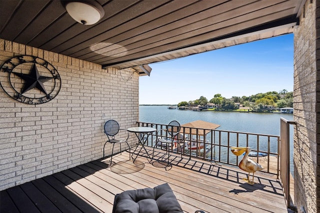 deck featuring a water view
