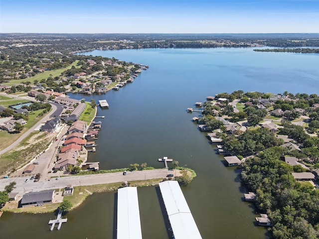 bird's eye view featuring a water view and a residential view