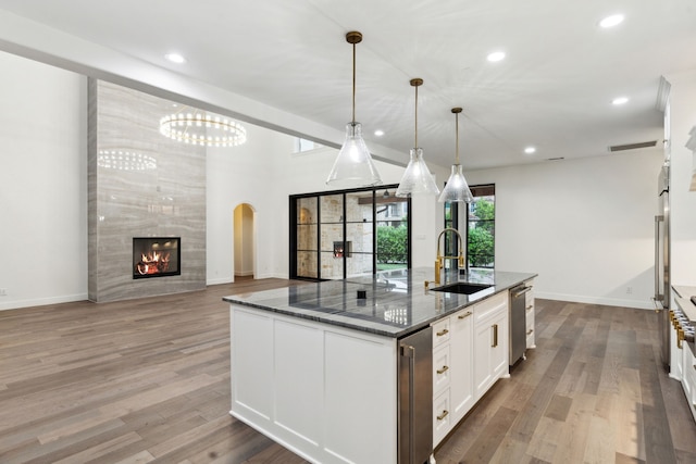 5309 Settlement Way, Mckinney, TX 75070 - kitchen with a sink, dishwasher, dark stone countertops, recessed lighting, and open floor plan