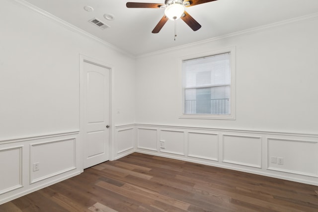 5309 Settlement Way, Mckinney, TX 75070 - spare room with crown molding, a ceiling fan, dark wood-style floors, a decorative wall, and wainscoting